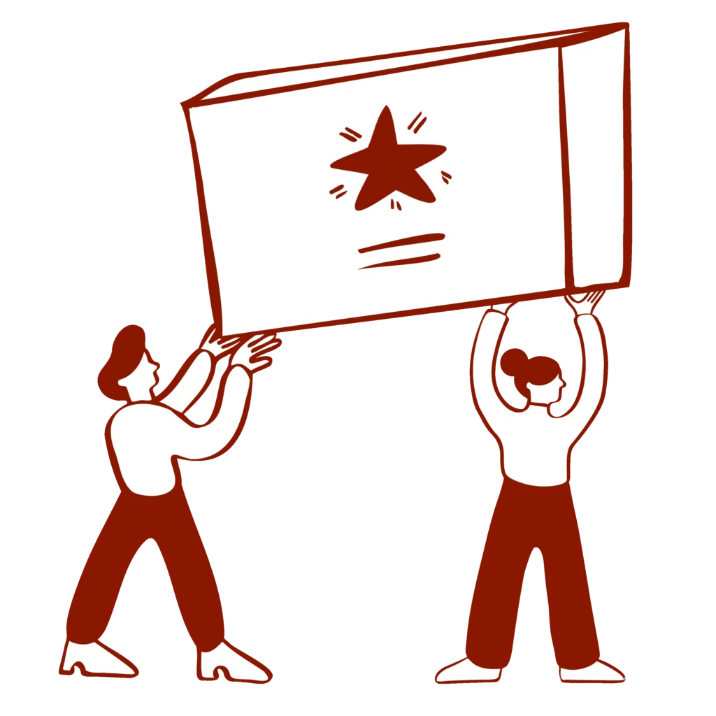 Two people carrying a large box.